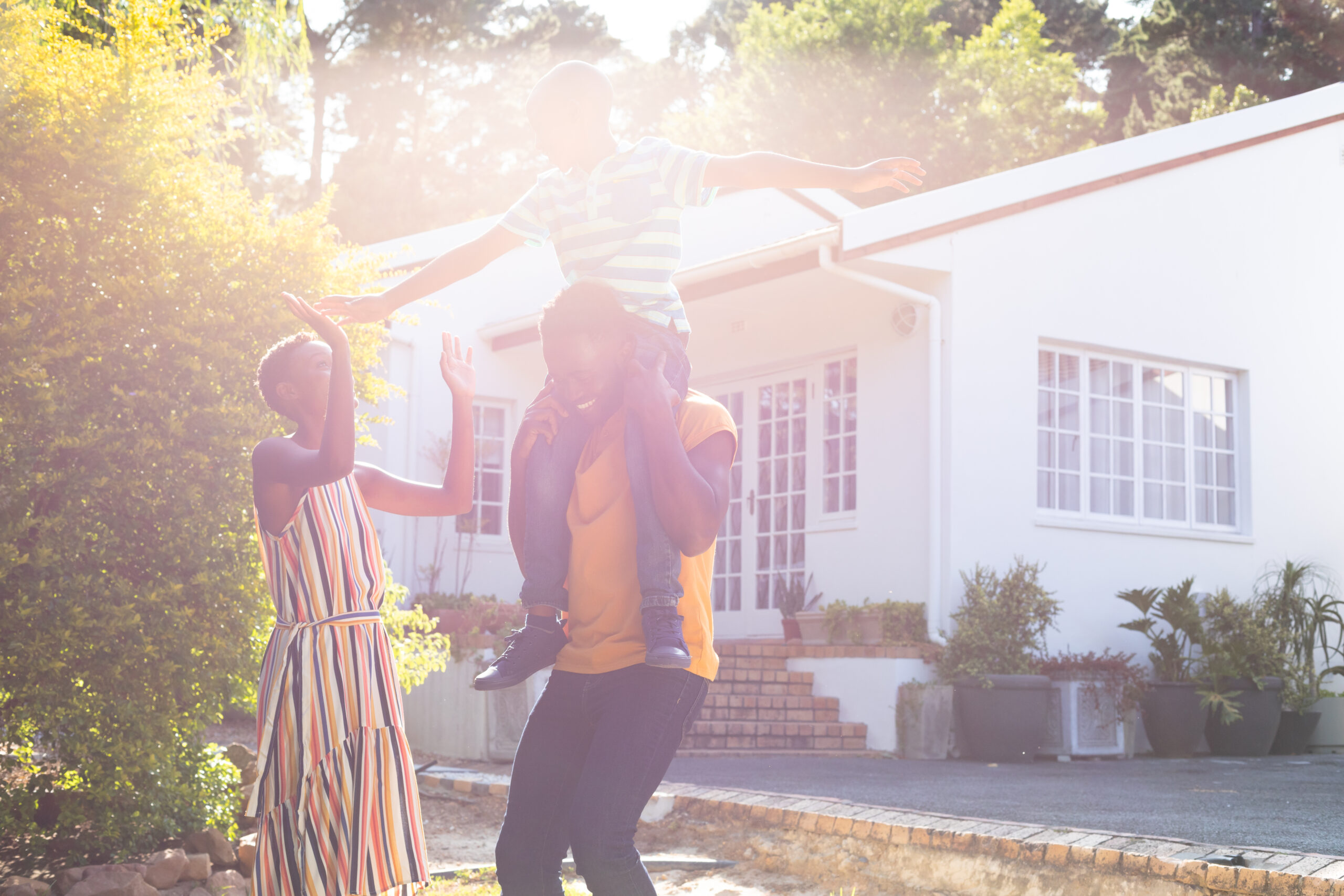woman and man signing paperwork