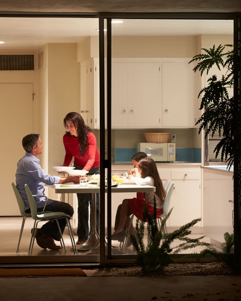 Family eating dinner, father son and kid